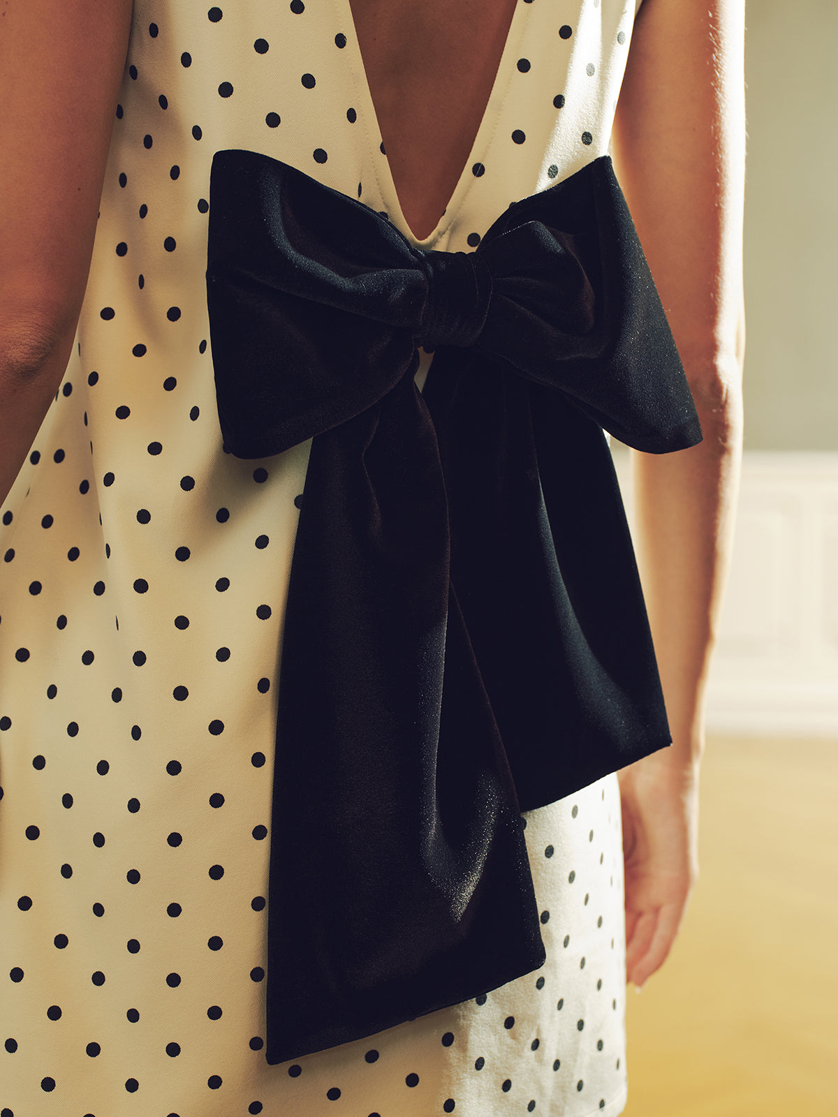 Polka Dot Mini Dress with Back Bow Detail